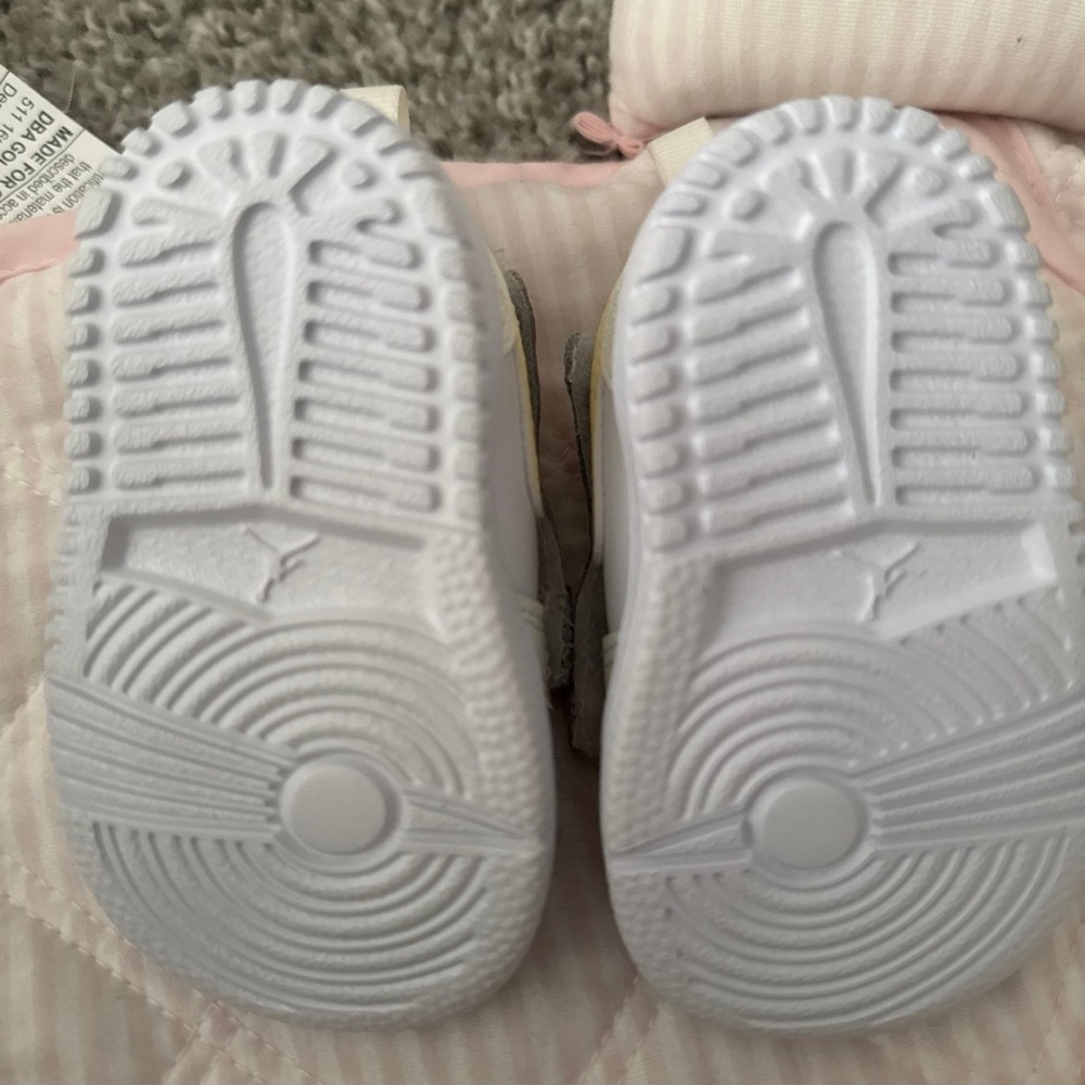 Nike White Sneakers with Geometric Tread Design